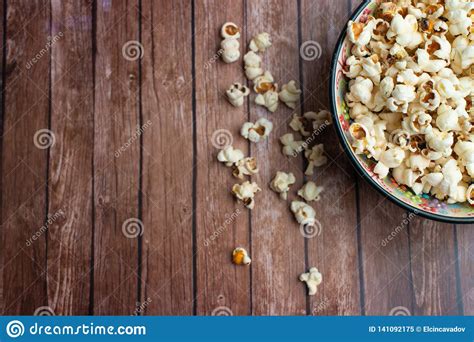 Salt Popcorn On The Wooden Table Popcorn In A Wooden Bowl Stock Image