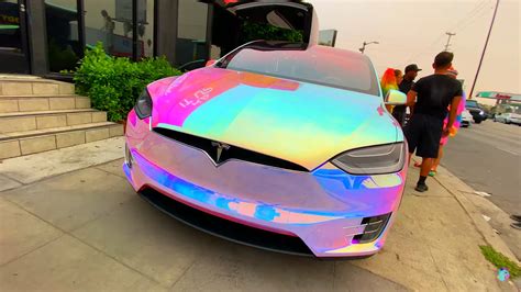 Account follows the most notorious tesla owners club in the world & the founders journey as an owner. Tesla owner graffitis own car for bizarre 'Unicorn' wrap