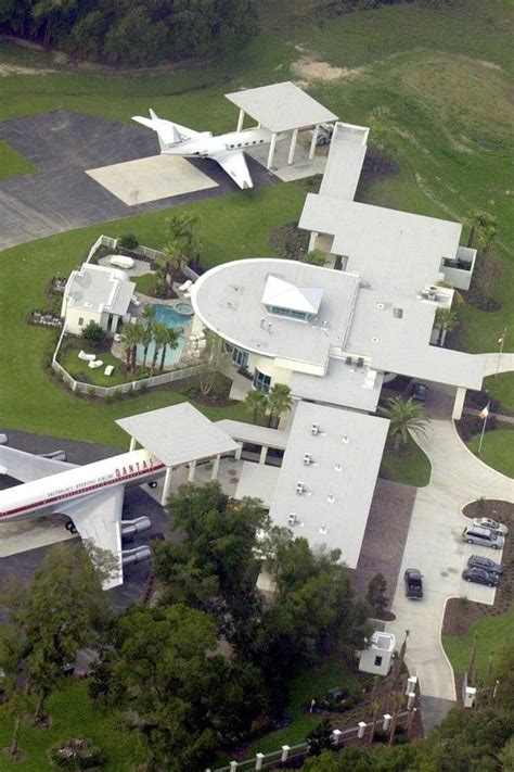 John Travoltas Florida Mansion Has The Appearance Of A Mini Airport From Above John Travolta