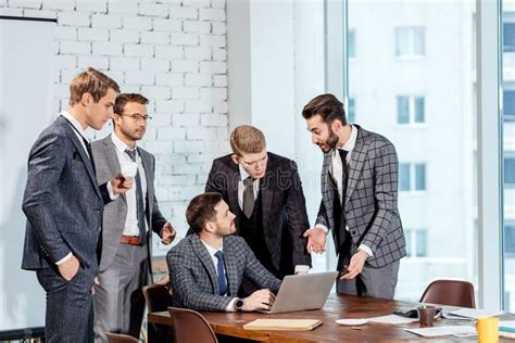Young Boss With Colleagues In Office Stock Image Image Of Europe