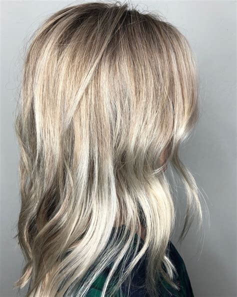 Even if you are a raven haired brunette, your blonde self is waiting deep within you just wishing for an opportunity to be let out. 15 Best Ash Blonde Hair Colors of 2020