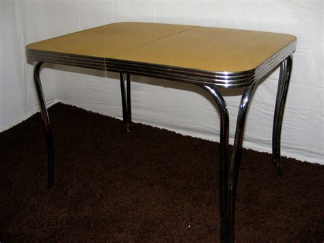 High commercial quality materials are used such as chrome edges bases and legs formica table tops and top grade vinyl chairs. 1950's Formica kitchen Table | Flickr - Photo Sharing!