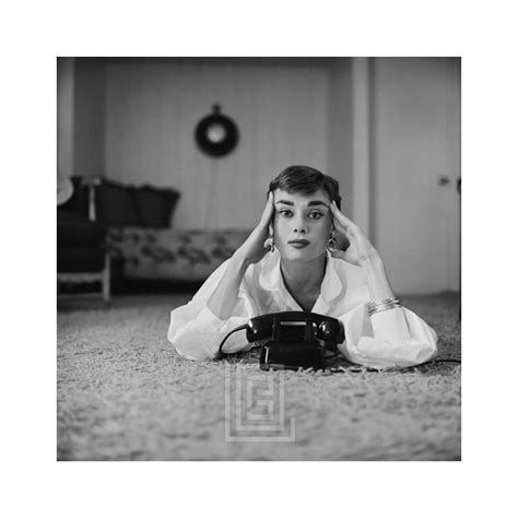 Mark Shaw Audrey Hepburn In White Blouse With Phone Laying Fingers