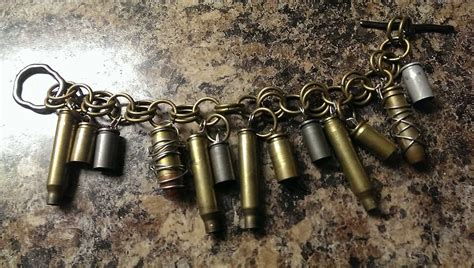 I have spent lots of time a the firing range looking down at the ground at all the shiny brass thinking what happens to all of it. Pin by Brandon Toney on ]+[ BULLET JEWELRY - HANDCRAFTED BLASTS OF ART | Bullet jewelry ...