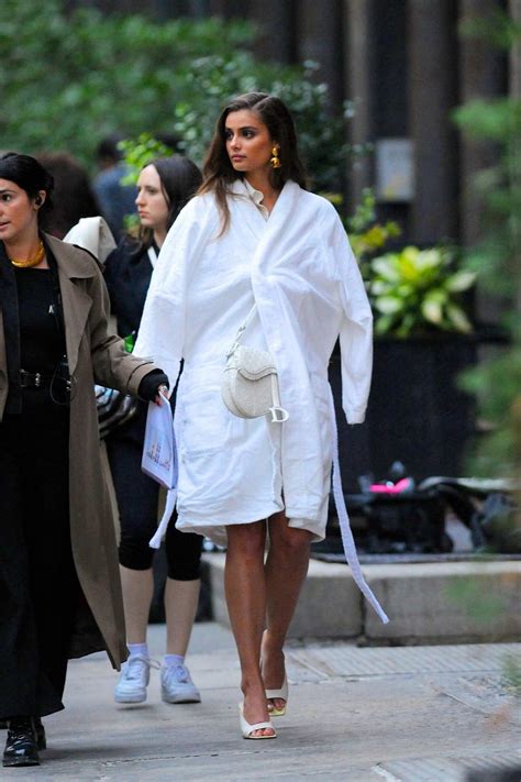 Taylor Hill Stuns In All White Ensemble During A Photoshoot On The