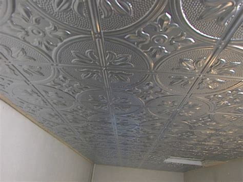 Adhesives are used if the ceiling is made of materials that produce sound. How to Install a Stamped Tin Ceiling | how-tos | DIY