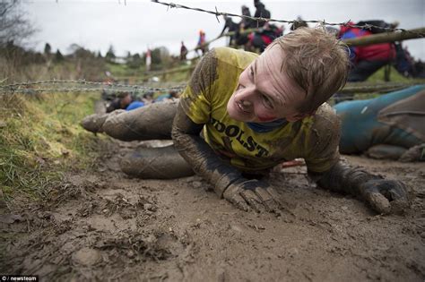 Tough Runners Plough Through Bogs And Blazing Fire In Annual Event Daily Mail Online