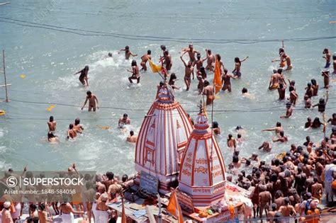 Naked Naga Sadhus Taking A Holy Bath During The Kumbha Or Kumbh Mela In The Ganges River Har Ki