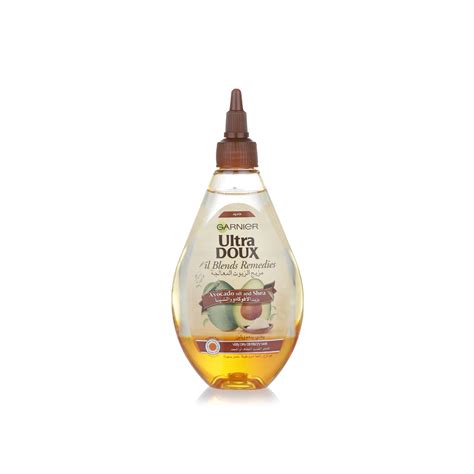 And now i will be reviewing this oil which has natural extracts of coconut, wheatgerm, and almond oil. Garnier Ultra Doux avocado & shea oil 140ml - Spinneys UAE