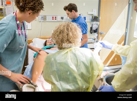 Woman Giving Birth In Hospital Stock Photo Alamy