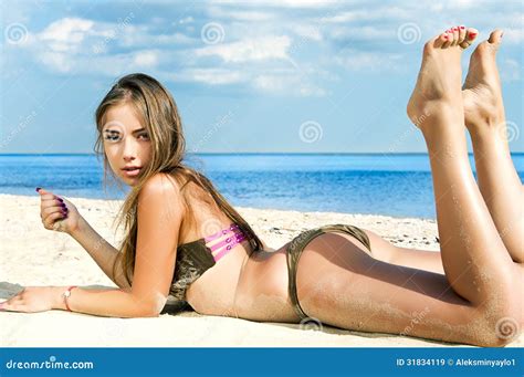 Beautiful Woman Lying On The Beach Royalty Free Stock Images Image 31834119