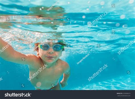 Small Boy Swimming Wearing Goggles Under Stock Photo 243990610