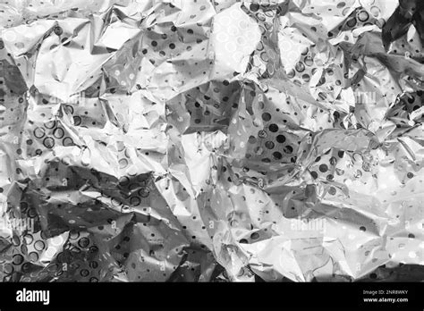 Texture Of Crumpled Aluminium Foil As Background Closeup Stock Photo