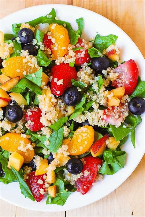 In a small bowl whisk together the dressing ingredients. Quinoa salad with spinach, strawberries, blueberries ...