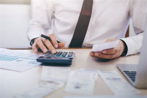 Male Accountant Or Banker Calculate The Cash Bill Stock Photo Image