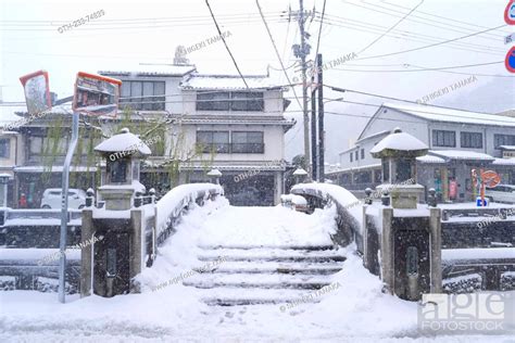 Snow On Otani River Kinosaki Onsens Hot Springs In Winter Stock
