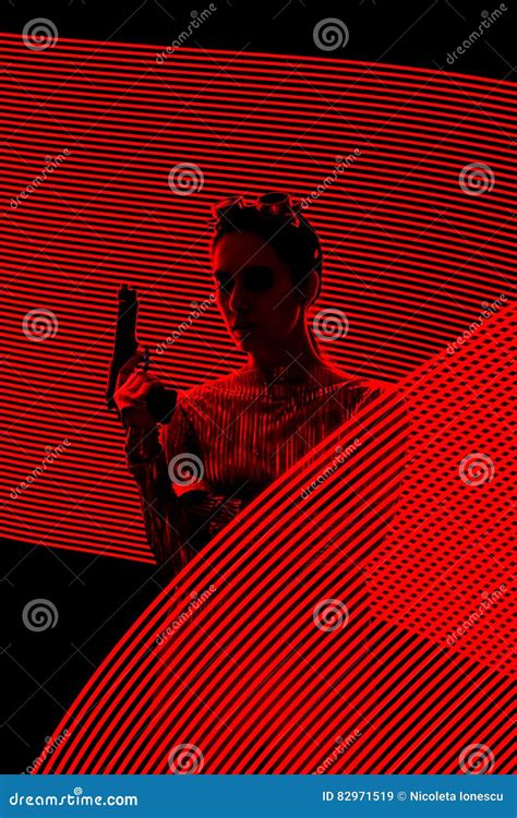 Secret Agent Spy Silhouette In Light Painting Backdrop Stock Image