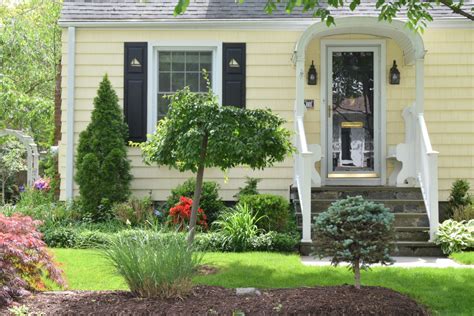 Boost your home's curb appeal with these paint colors. New England Homes- Exterior Paint Color Ideas - Nesting With Grace