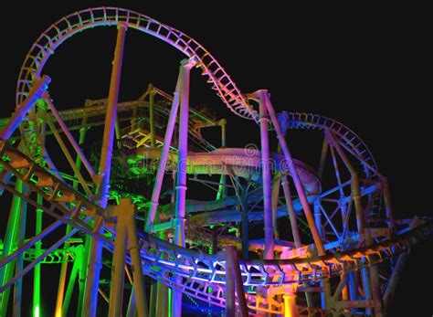 Rollercoaster Lit Up With Different Colors Of Light At Night Ad Lit Roll Roller