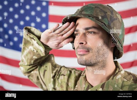 Confident Soldier Saluting Stock Photo Alamy