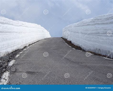 Snowy Road Mountain Road With High Snow Wall In Norway Stock Image