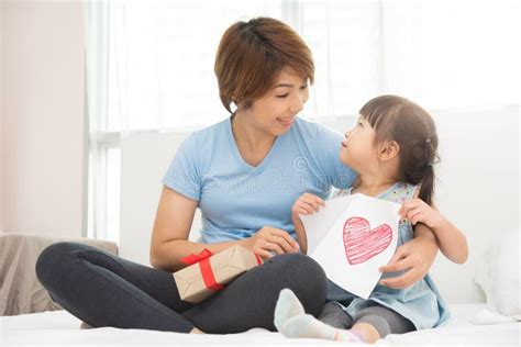 Asian Mother Playing Ticklish With Her Daughter Stock Image Image Of
