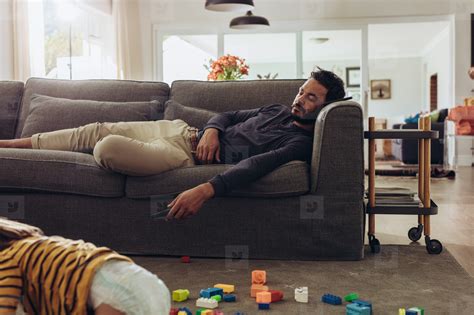 Man Sleeping On Couch At Home Stock Photo 164335 Youworkforthem