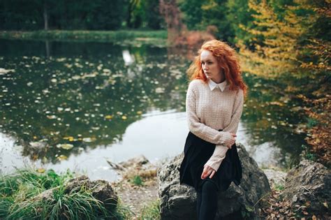 Premium Photo Redhead Girl In Autumn Park