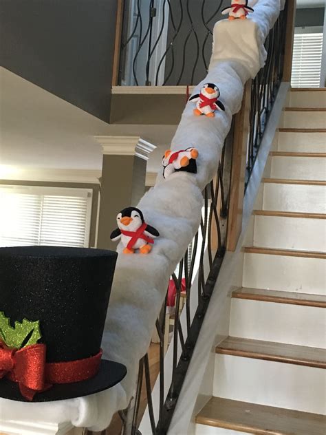 Penguins Sliding On Snow Down Our Staircase Banister