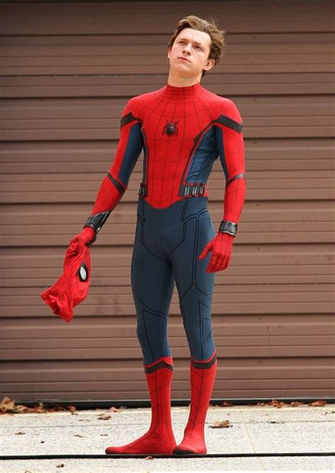 The only thing he was able to learn about him was that he wore red and blue spandex. Tom Holland in Spiderman Costume without mask - stuarte