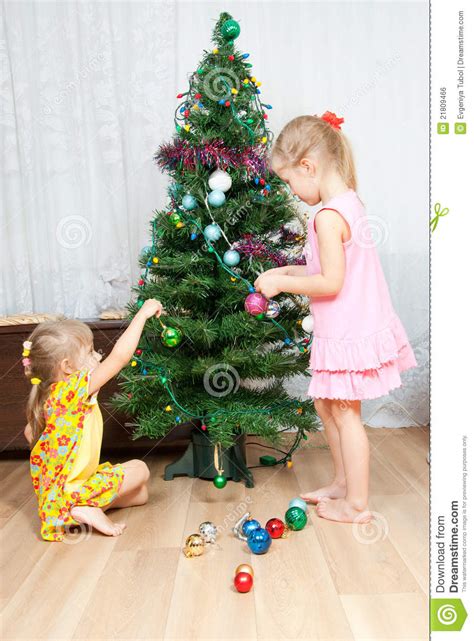 Christmas family traditions, christmas ornaments, christmas crafts, christmas photography, christmas fun foods, christmas recips and more! Children Decorate The Christmas Tree Stock Photo - Image ...