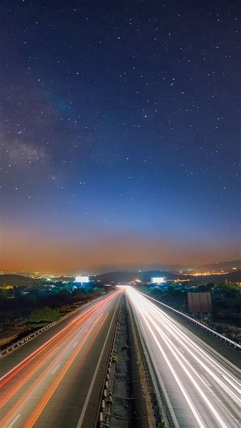 Download Wallpaper 720x1280 Starry Sky Night Road Traffic Samsung
