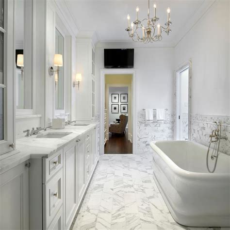 Either on the floor or on the small bathroom walls, will look chic and sophisticated. Master Bathroom in White | HGTV