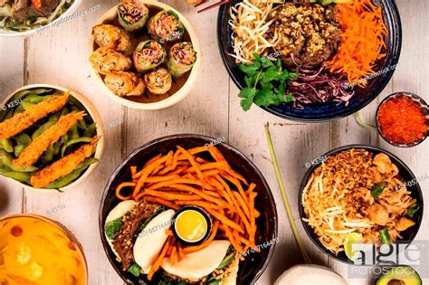 Asian Food Background With Various Ingredients On Rustic Wooden