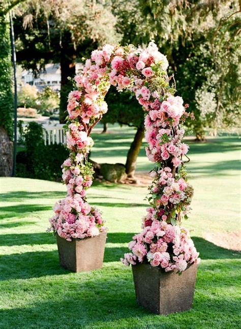 26 Floral Arches That Will Make You Say I Do Floral Arch Floral