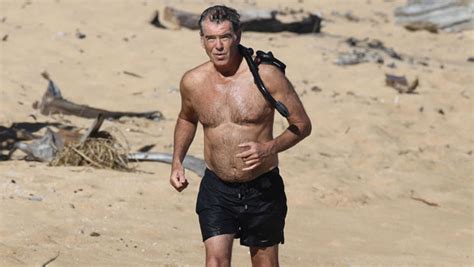 Pierce Brosnan 67 Goes Shirtless While Running On The Beach — Pics