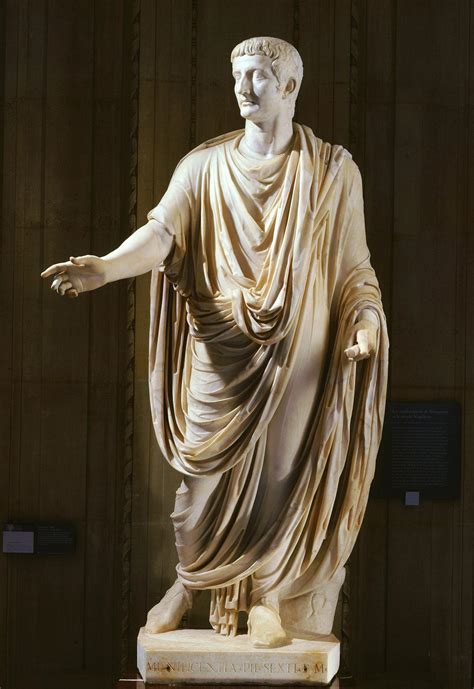 A Roman Marble Statue Of The Emperor Tiberius Wearing A Toga From Rome
