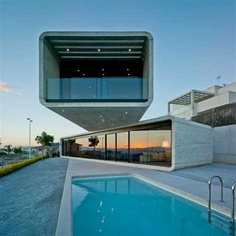 Clavel Arquitectos Stack Concrete To Create Cantilevered House
