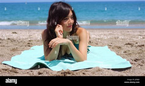Woman Sunbathing On Tropical Beach Hi Res Stock Photography And Images