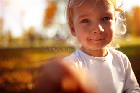 Portrait Of Beautiful Boy Child Little Boy In The Autumn Park Stock