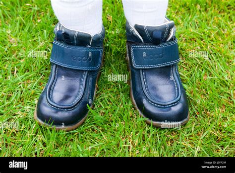 Childs Kid Young Kids Children S Shoes On The Wrong Feet So
