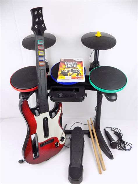 Nintendo Wii Guitar Hero Rock Band Bundle Drum Guitar Mic World