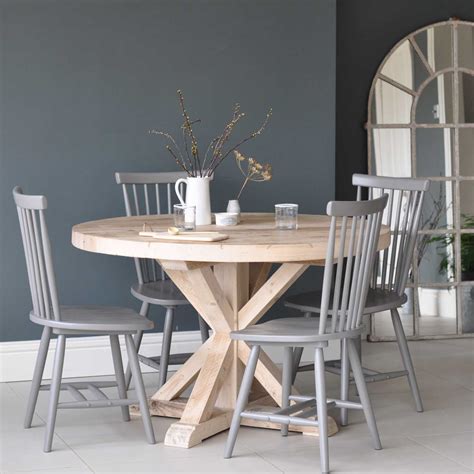 We have a variety of tabletop materials: Circular Reclaimed Wood Round Dining Table