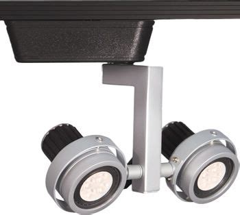 Its interchangeable fixtures or track heads can be inserted at any point on that track, up to a maximum number of fixtures. WAC Double Droid 817LED Premium Low Voltage LED Track Head ...