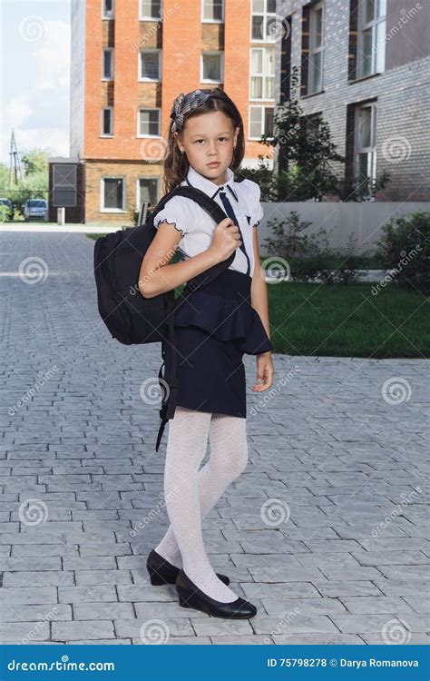 Cute Schoolgirl In Uniform Standing In Campus Stock Photo Image Of
