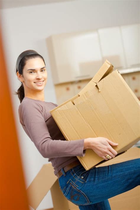 Young Woman Lifting Cardboard Box Stock Image Image Of Cardboard