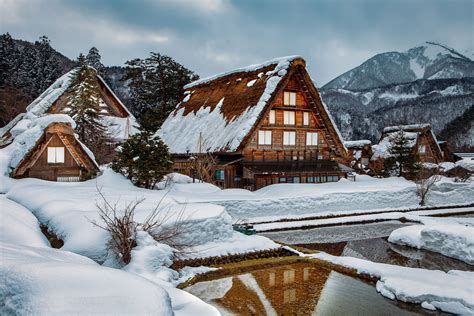 Snowy Cabins The Historic Village Of Shirakawa Go In The Remote