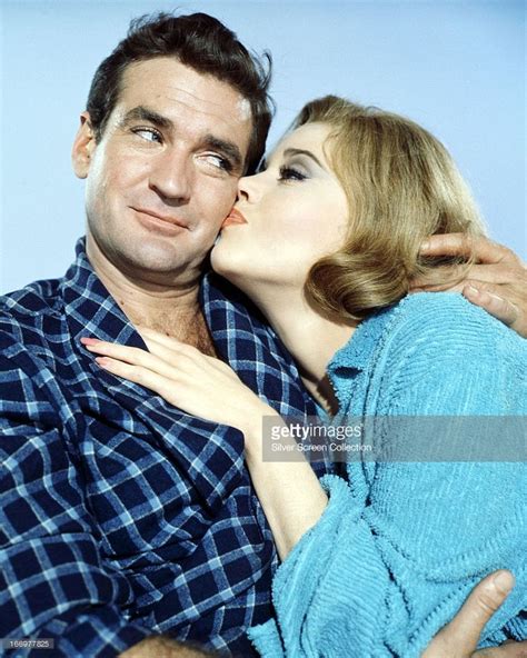 Jane Fonda Kissing Rod Taylor In A Promotional Portrait For Sunday