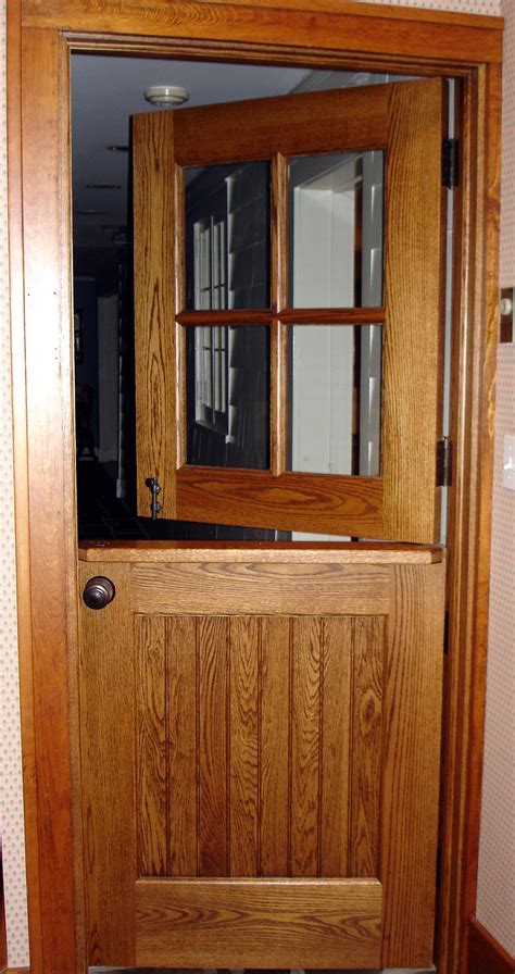 a wooden door with a glass pane