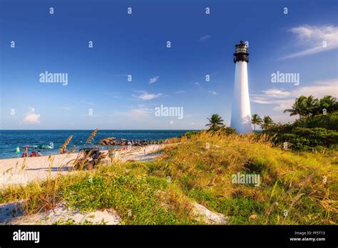 The Beach And Cape Florida Lighthouse At Sunset Key Biscayne Miami